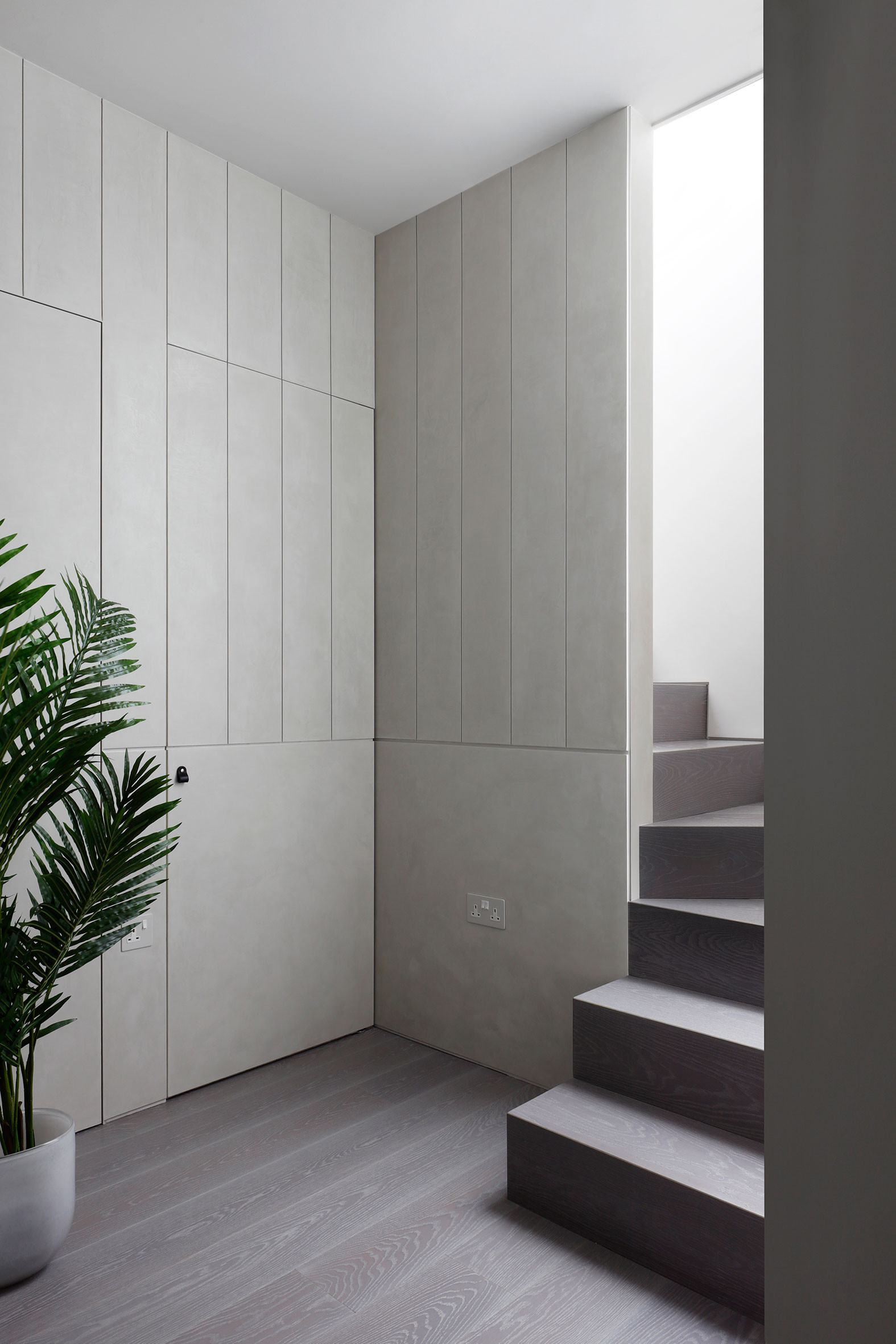 MWAI hallway polished plaster minimal stair light