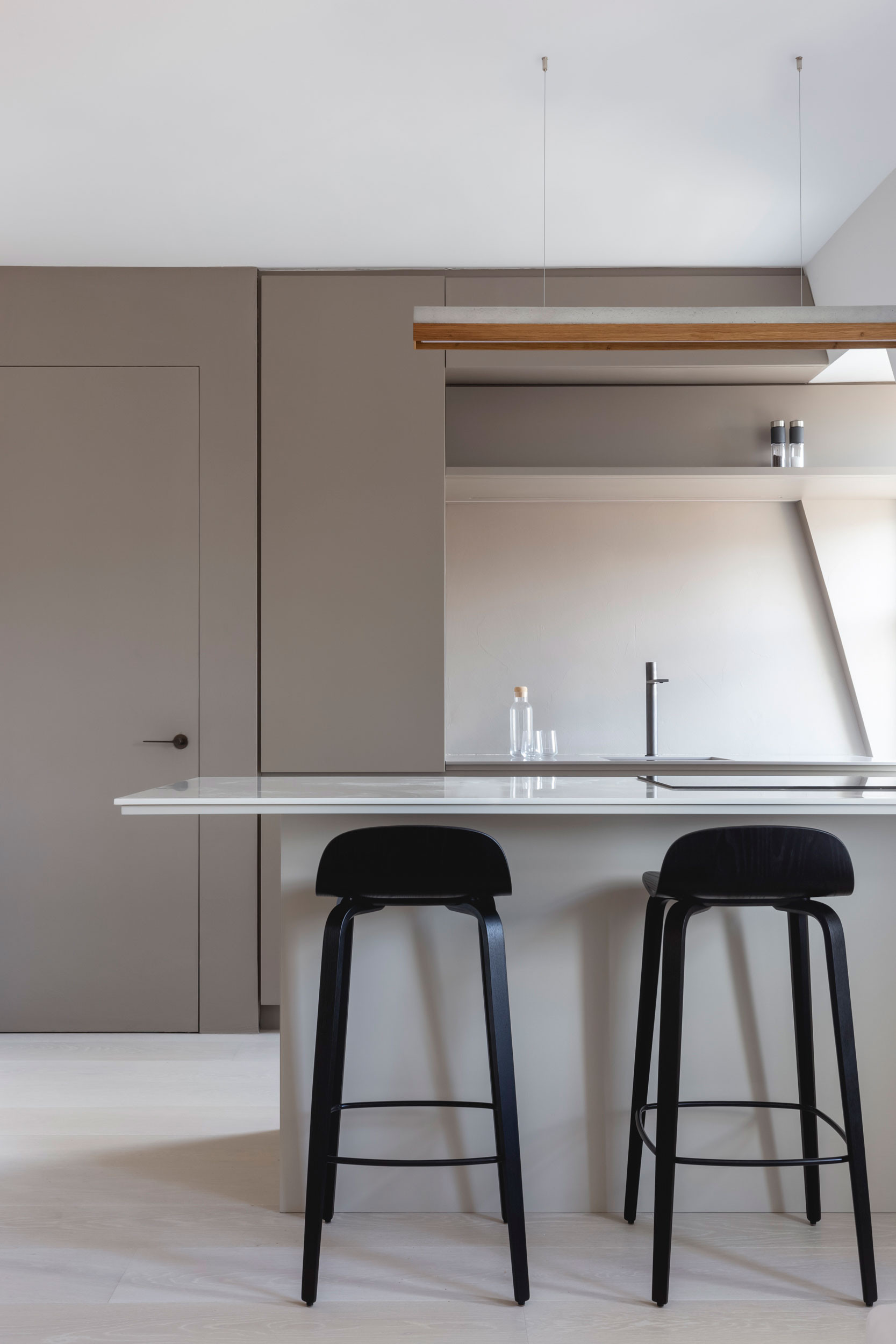 mwai micro cement kitchen minimalist Mayfair Apartment