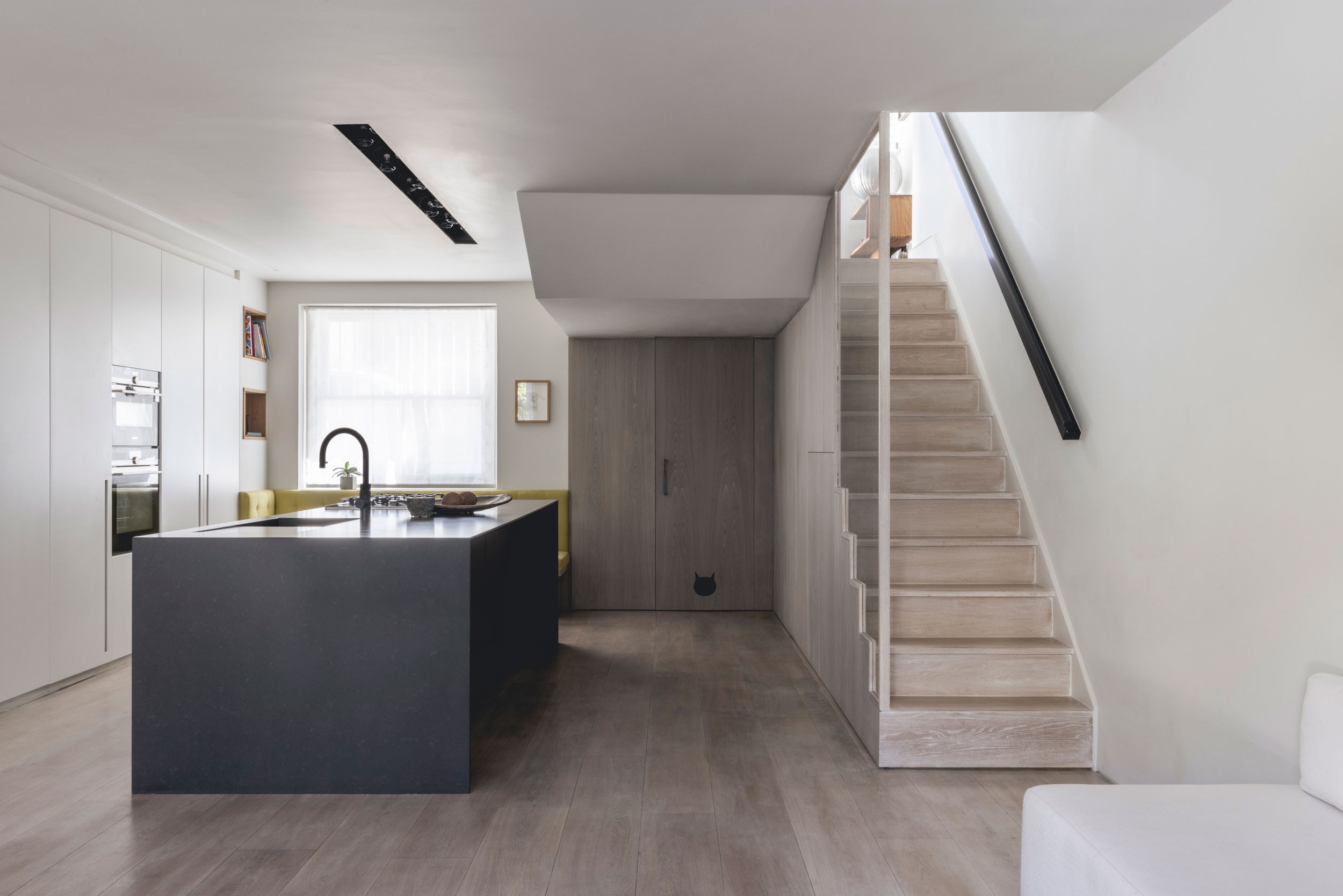 mwai portland road lower ground kitchen black island timber minimalist